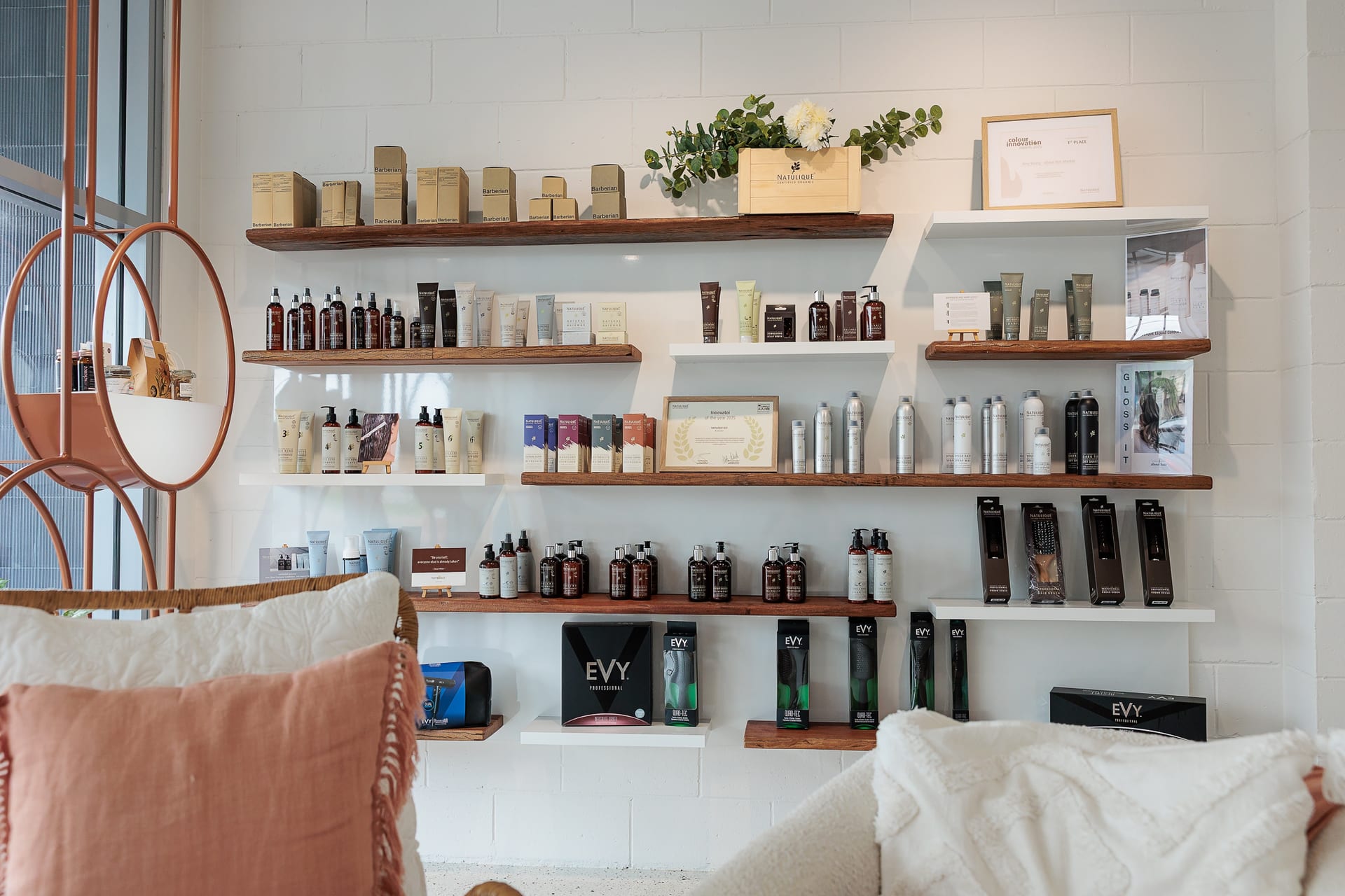 Range of NATULIQUE organic hair products at About Hair Mackay, a short drive from Mount Pleasant