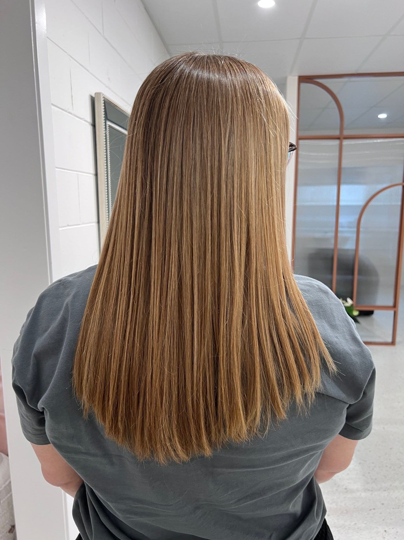 Smoothed, frizz-free hair after BR Soul Botox smoothing treatment